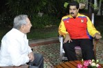 Raul Castro and Nicolás Maduro.