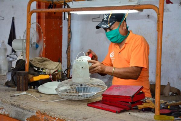 sancti spiritus, mechanic in repair shop