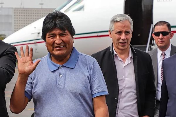 evo morales is with alberto fernandez upon arrival in argentina after coup