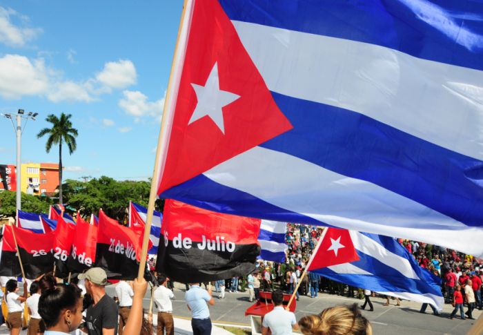 cuban youth with flags