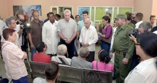 diaz-canel with relatives of victims