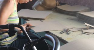 Disabled woman in workshop