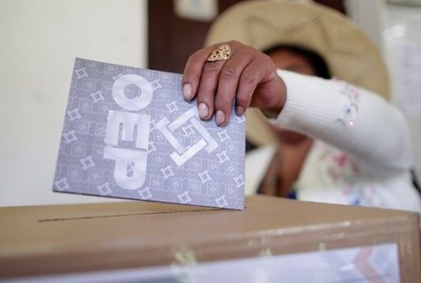 A woman casts her vote at a polling station during the presidential election in Paracti in the Chapare region, Cochabamba, Bolivia, Oct. 20, 2019.