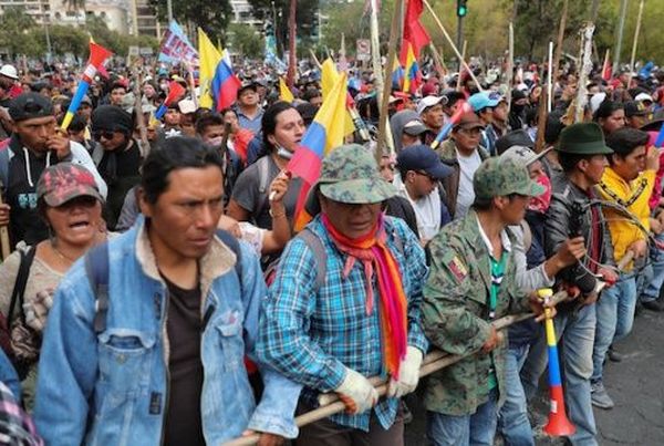 Demonstrators participate in a protest in Ecuador against measures announced by President Lenin Moreno