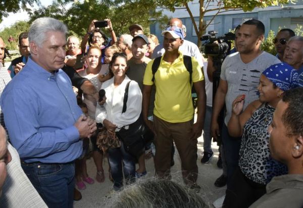 Díaz-Canel talks to local residents during his visit to Ciego de Avila.