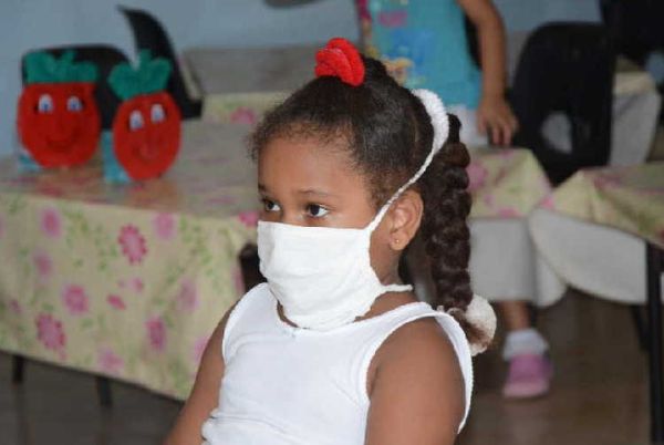 child wearing face mask, sancti spiritus, cuba