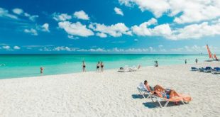Tourists enjoy the sun, the sea and the sand in Varadero resort